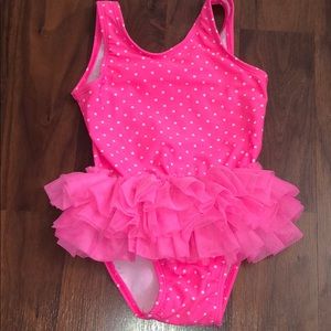 Hot pink polka dot one piece with fringe